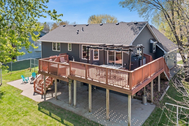 7165 Upper 157th St W, Apple Valley, MN 55124 - rear view of property featuring roof with shingles, a patio area, and a deck