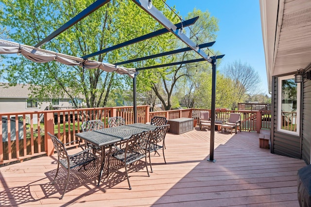 7165 Upper 157th St W, Apple Valley, MN 55124 - deck with outdoor dining space and a pergola