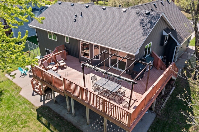 7165 Upper 157th St W, Apple Valley, MN 55124 - rear view of property featuring a deck, a shingled roof, a patio, and outdoor dining area