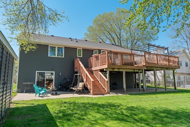 7165 Upper 157th St W, Apple Valley, MN 55124 - rear view of house featuring a deck, a patio area, stairway, and a lawn
