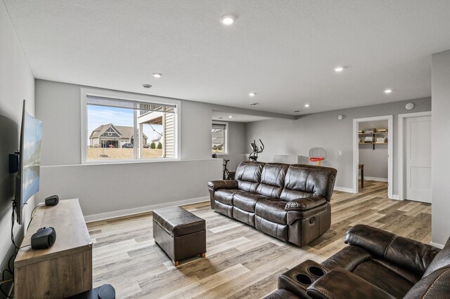 2301 Kester Ave NE, Saint Michael, MN 55376 - living room featuring recessed lighting, light wood finished floors, and baseboards
