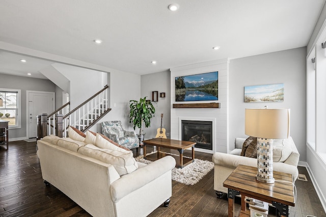 2301 Kester Ave NE, Saint Michael, MN 55376 - living room with a fireplace, baseboards, dark wood-style floors, stairway, and recessed lighting