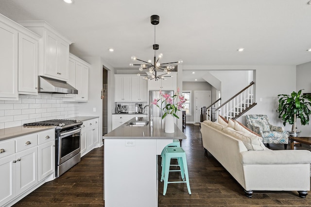 2301 Kester Ave NE, Saint Michael, MN 55376 - kitchen featuring a sink, stainless steel appliances, open floor plan, recessed lighting, and under cabinet range hood