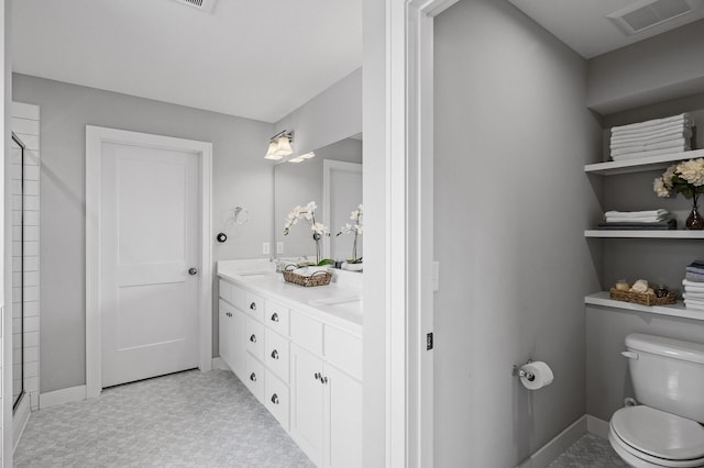 2301 Kester Ave NE, Saint Michael, MN 55376 - bathroom with visible vents, double vanity, a shower, toilet, and a sink