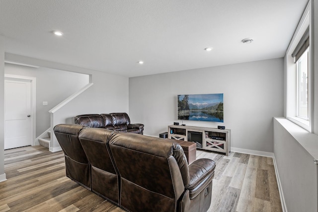 2301 Kester Ave NE, Saint Michael, MN 55376 - living area featuring stairway, baseboards, light wood-style floors, and recessed lighting