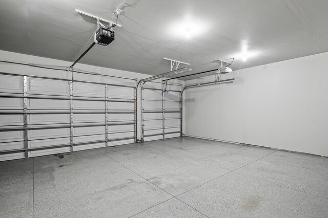 2301 Kester Ave NE, Saint Michael, MN 55376 - garage featuring a garage door opener