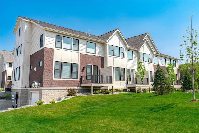 2315 Simply Living Ln Unit C, Hudson, WI 54016 - view of front of home with brick siding and a front lawn