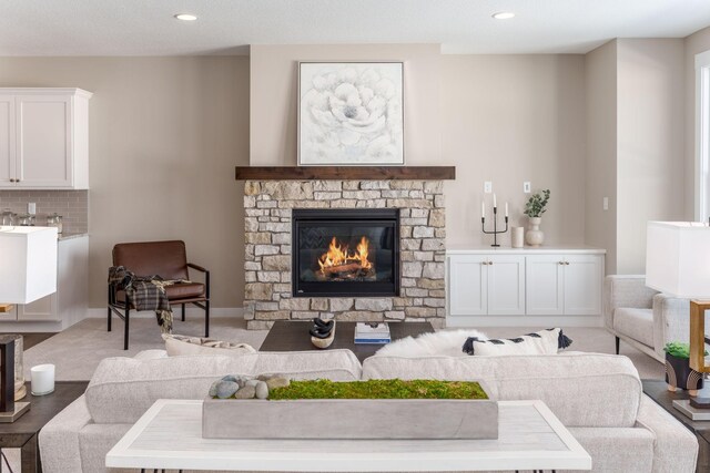 2315 Simply Living Ln Unit C, Hudson, WI 54016 - carpeted living area featuring a fireplace and recessed lighting