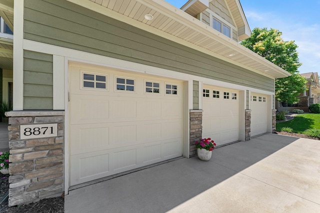 8871 Kahl Way NE, Otsego, MN 55362 - garage featuring driveway