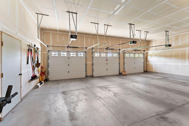 8871 Kahl Way NE, Otsego, MN 55362 - garage featuring a garage door opener