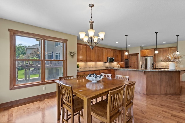 8871 Kahl Way NE, Otsego, MN 55362 - dining space with a chandelier, light wood-style floors, and recessed lighting