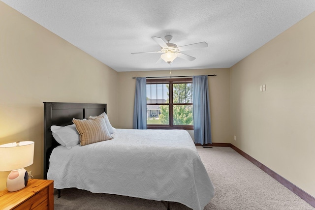 8871 Kahl Way NE, Otsego, MN 55362 - bedroom featuring light carpet, a ceiling fan, and a textured ceiling