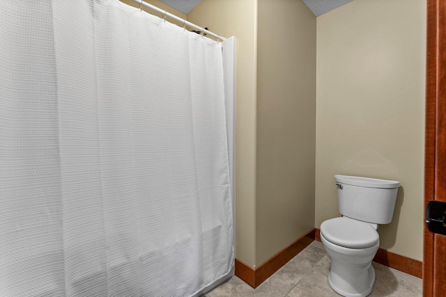 8871 Kahl Way NE, Otsego, MN 55362 - bathroom featuring curtained shower and tile patterned floors