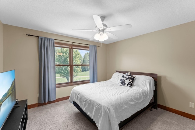 8871 Kahl Way NE, Otsego, MN 55362 - bedroom with carpet floors, ceiling fan, and a textured ceiling