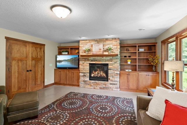 8871 Kahl Way NE, Otsego, MN 55362 - living room with a stone fireplace and a textured ceiling
