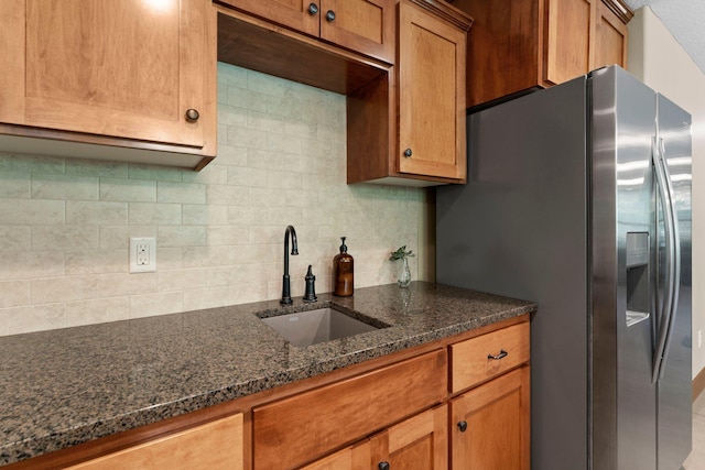 8871 Kahl Way NE, Otsego, MN 55362 - kitchen featuring stainless steel fridge, tasteful backsplash, and brown cabinets