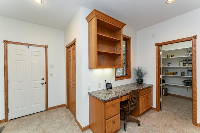 3065 Grand View Ln SW, Byron, MN 55920 - home office with built in study area, recessed lighting, and baseboards