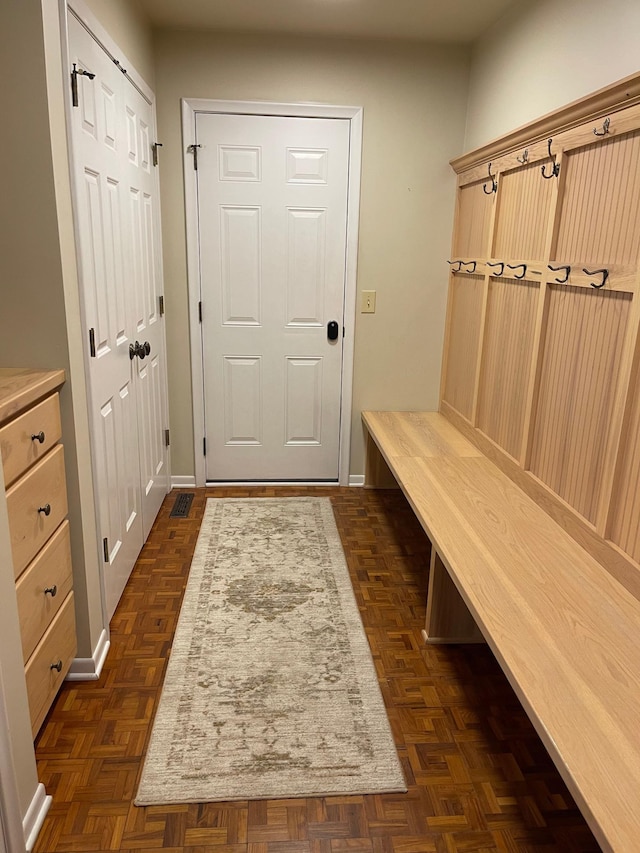 mudroom featuring baseboards