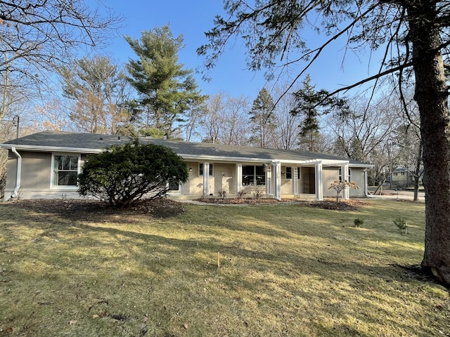 ranch-style house with a front yard