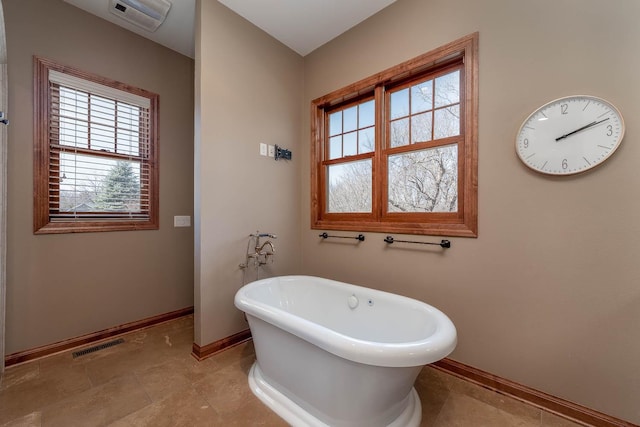 190 Stony Creek Rd, Mankato, MN 56001 - bathroom with a freestanding tub and baseboards