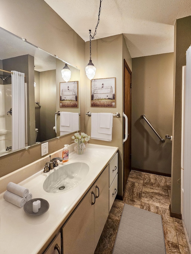 14199 Riverbend Trl, Rocksbury Twp, MN 56701 - full bath with vanity, a textured ceiling, a shower with shower curtain, toilet, and stone finish flooring