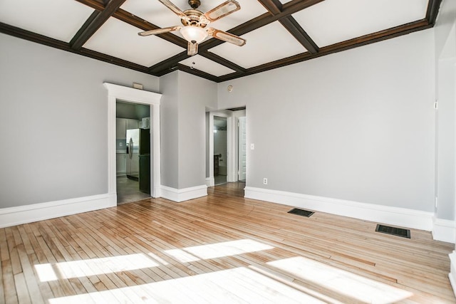 unfurnished room with visible vents, light wood-style flooring, a ceiling fan, and coffered ceiling