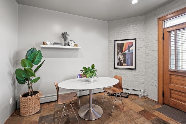 438 Portland Ave Unit 7, Saint Paul, MN 55102 - dining area with stone tile floors, recessed lighting, and a baseboard radiator