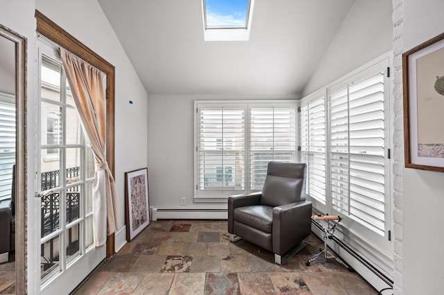 438 Portland Ave Unit 7, Saint Paul, MN 55102 - sitting room with a baseboard radiator, vaulted ceiling, stone finish floors, and a skylight