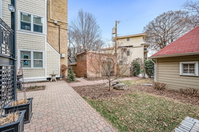 438 Portland Ave Unit 7, Saint Paul, MN 55102 - view of yard featuring a patio area and fence