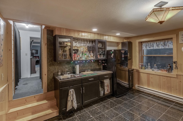 12124 County Road 118, Merrifield, MN 56465 - indoor wet bar with freestanding refrigerator, a baseboard heating unit, and recessed lighting