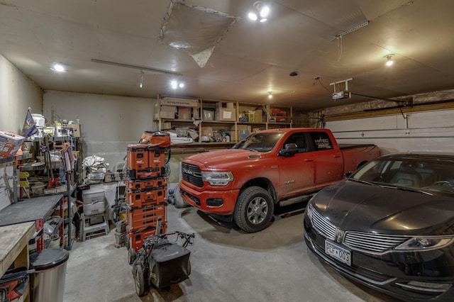 12124 County Road 118, Merrifield, MN 56465 - garage featuring a garage door opener and a workshop area