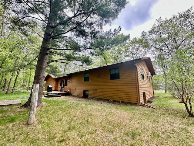 12124 County Road 118, Merrifield, MN 56465 - back of property featuring a yard and a wooden deck