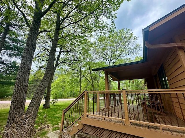 12124 County Road 118, Merrifield, MN 56465 - wooden terrace featuring a yard