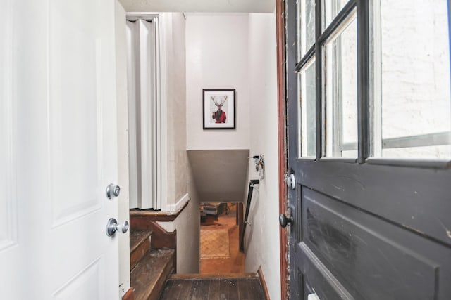 doorway with wood finished floors