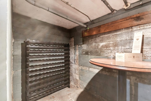 wine cellar with concrete flooring