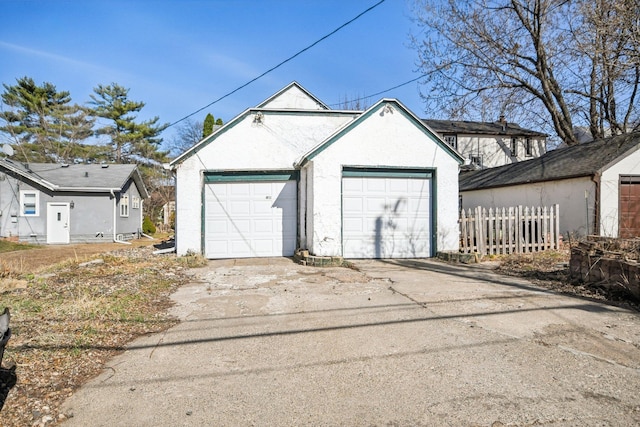 detached garage with fence