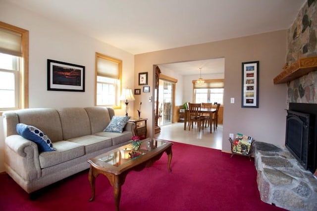 20437 County Highway 65, Henning, MN 56551 - living room with carpet flooring and a fireplace
