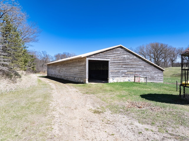 20437 County Highway 65, Henning, MN 56551 - view of pole building with a lawn