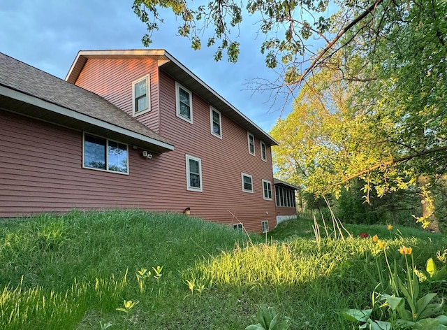 20437 County Highway 65, Henning, MN 56551 - view of side of property with roof with shingles