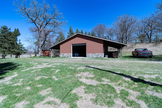 20437 County Highway 65, Henning, MN 56551 - view of pole building featuring a yard