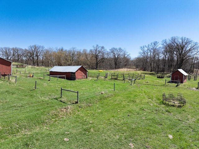 20437 County Highway 65, Henning, MN 56551 - view of yard with an outdoor structure, a view of countryside, and an outbuilding