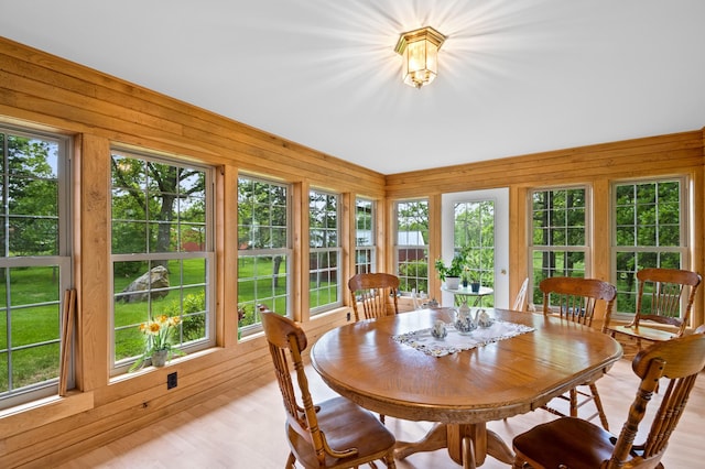 20437 County Highway 65, Henning, MN 56551 - sunroom featuring wood walls and wood finished floors