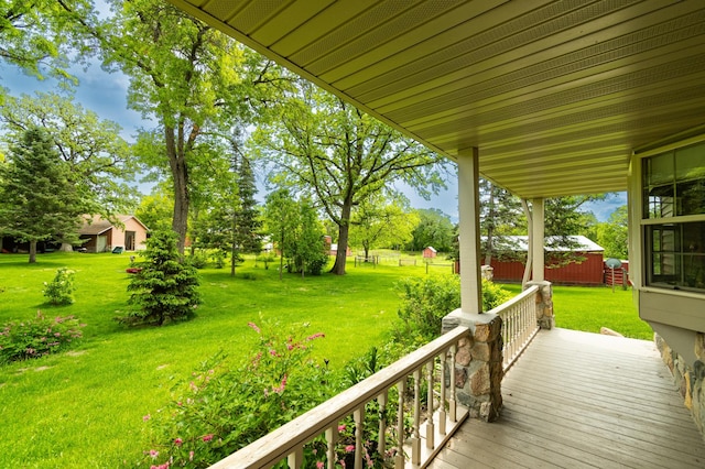 20437 County Highway 65, Henning, MN 56551 - wooden deck with a lawn