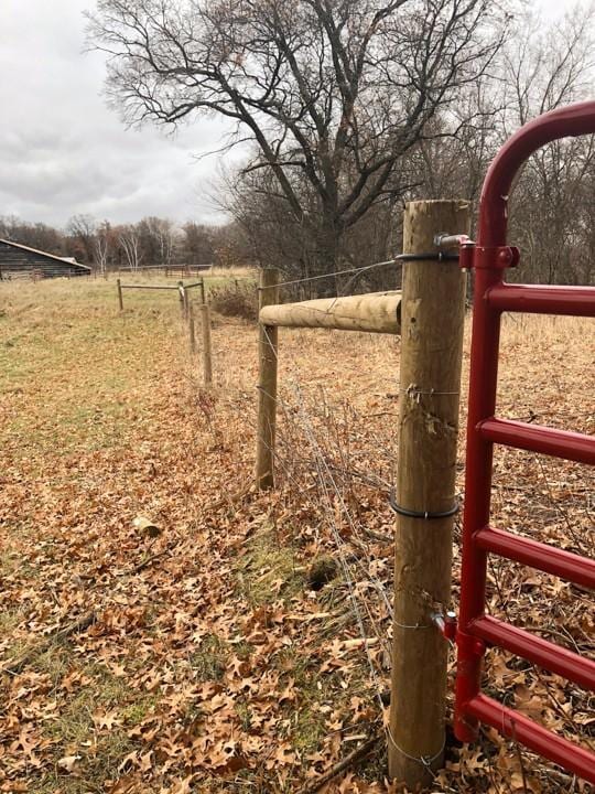 20437 County Highway 65, Henning, MN 56551 - gate with a rural view
