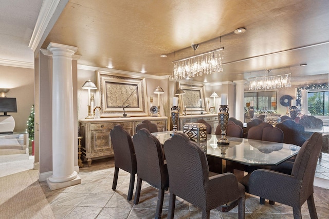 dining space with ornate columns, ornamental molding, baseboards, and a chandelier
