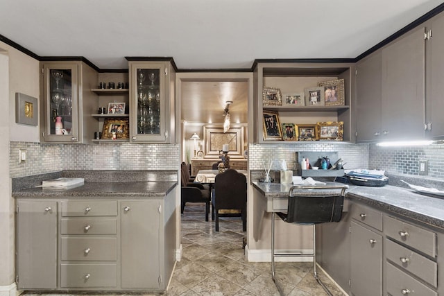 bar area with backsplash and light tile patterned floors