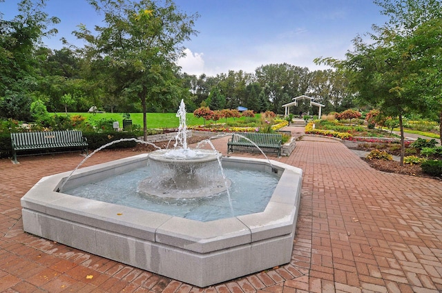 view of home's community featuring view of wooded area