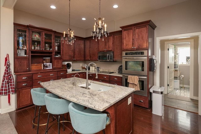 6724 Clarkia Dr NW, Rochester, MN 55901 - kitchen featuring stainless steel appliances, a sink, dark wood-style floors, a chandelier, and recessed lighting