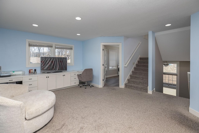 6724 Clarkia Dr NW, Rochester, MN 55901 - home office with light colored carpet, baseboards, recessed lighting, and built in desk