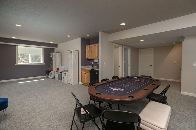 6724 Clarkia Dr NW, Rochester, MN 55901 - recreation room featuring light carpet, baseboards, recessed lighting, and a sink